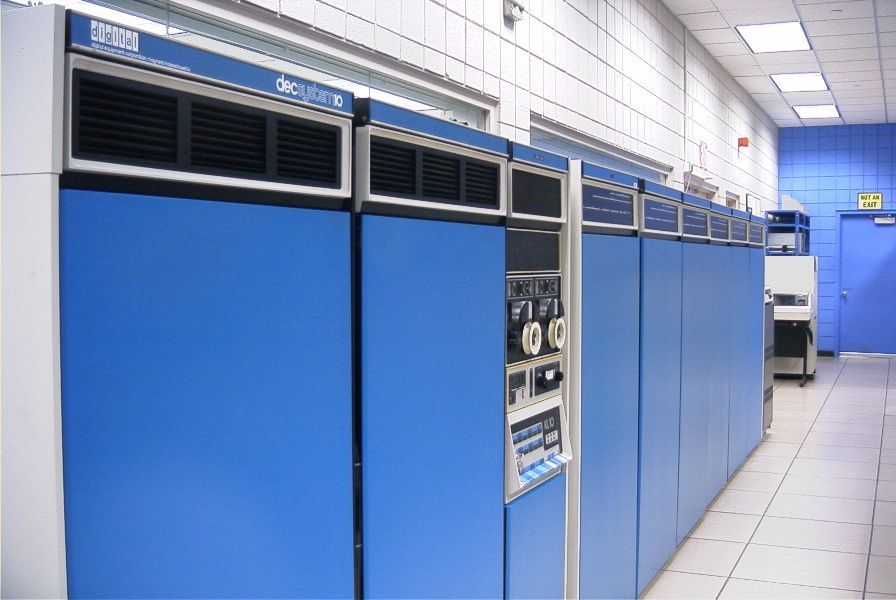 Blue DECsystem-1090 mainframe cabinets in a machine room